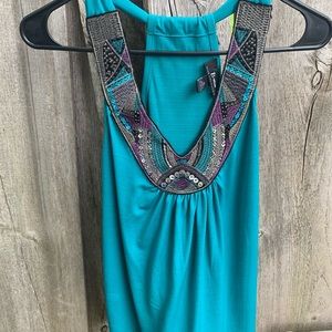 Turquoise beaded neckline racerback tank top.